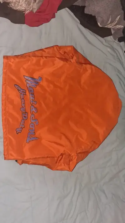 Chaqueta cortaviento naranja y negra - miniatura 3