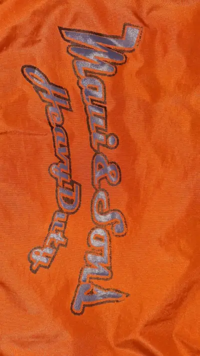 Chaqueta cortaviento naranja y negra - miniatura 4