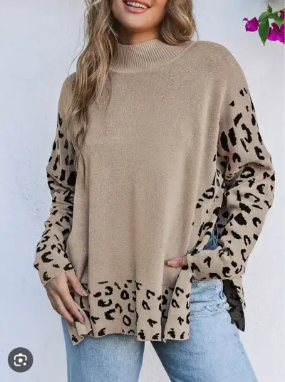 Suéter beige con estampado animal print - miniatura 1