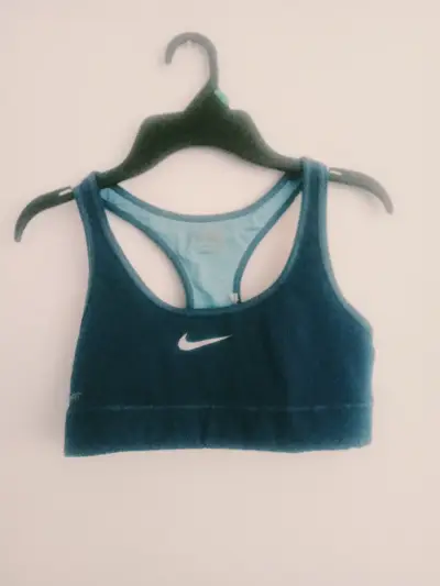 Top deportivo Nike verde petróleo para mujer - miniatura 1