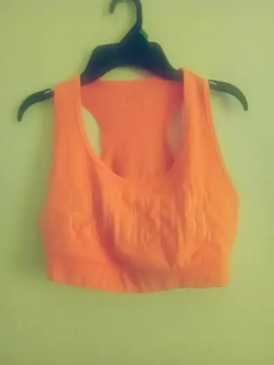 Top deportivo naranja para mujer - miniatura 1