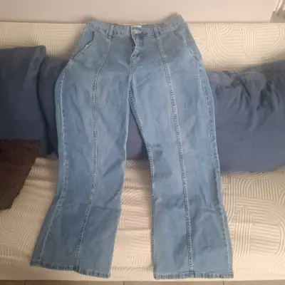 Jeans de mezclilla azul para mujer - miniatura 1