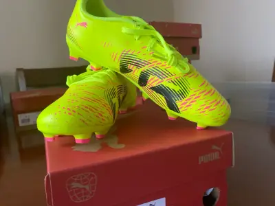 Zapatillas de fútbol Puma amarillas - miniatura 1