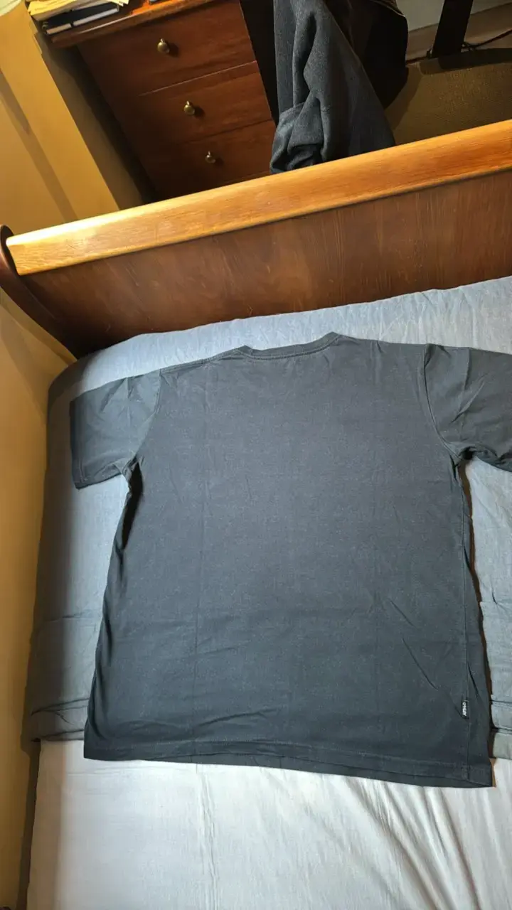 Polera negra Oakley con bolsillo - 3