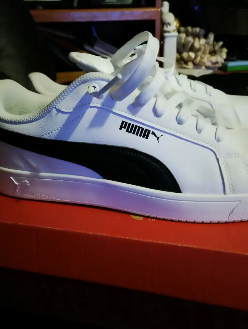 Zapatillas deportivas Puma blancas y negras - 1