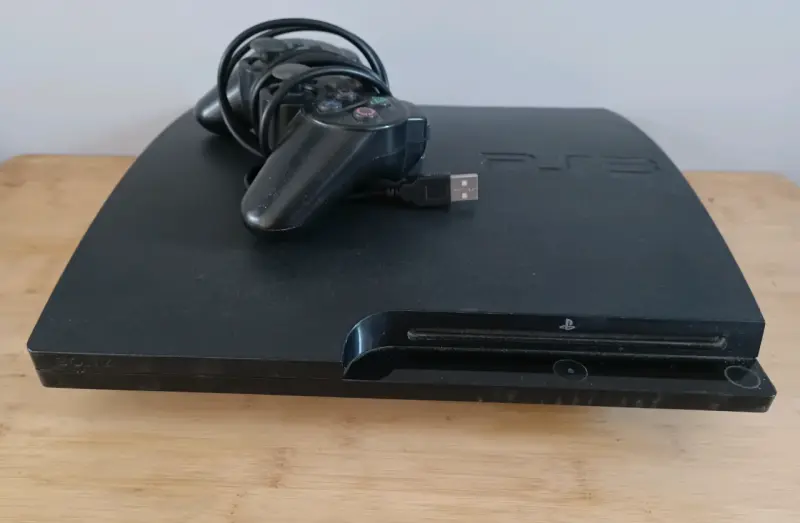 Consola PlayStation 3 con control y cable USB - 1