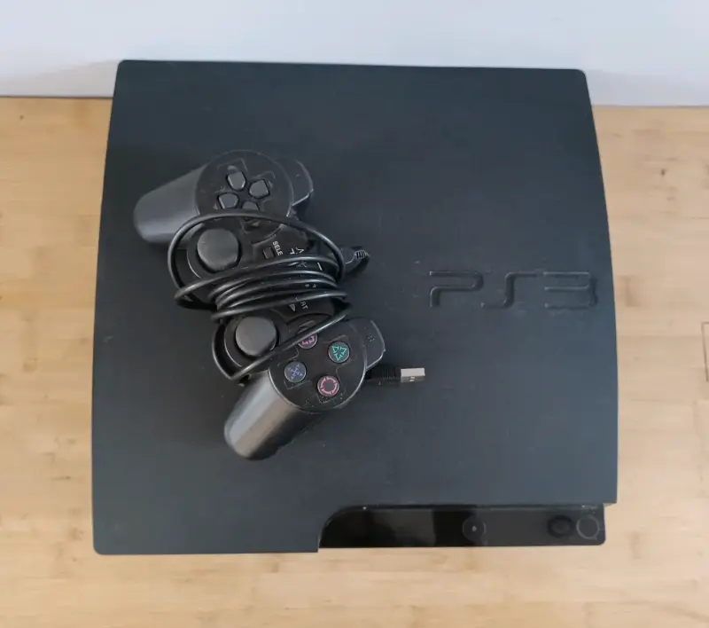 Consola PlayStation 3 con control y cable USB - 2