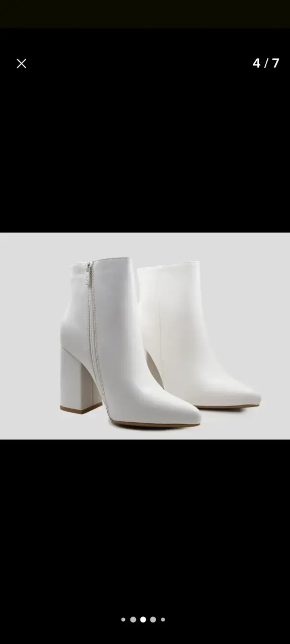 Botines blancos de tacón alto elegantes