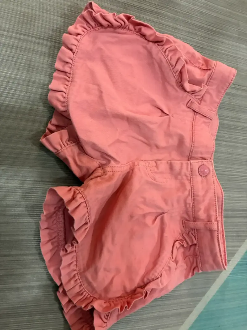 Shorts rosados con volantes para niña - 1