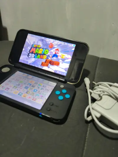 Consola New Nintendo 2DS LL en buen estado - miniatura 2