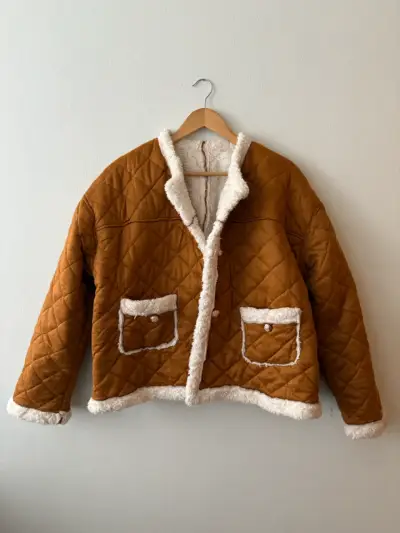 Chaqueta acolchada marrón con forro de lana - miniatura 1