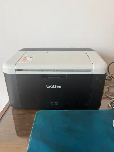 Impresora láser Brother HL-1202 compacta - miniatura 1