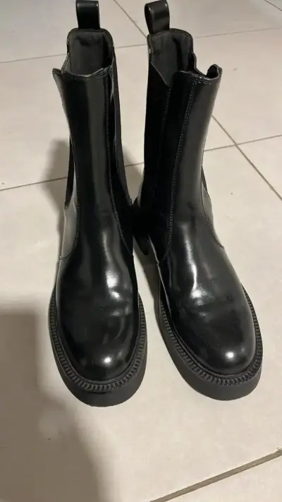 Botines negros de cuero elegantes - miniatura 1