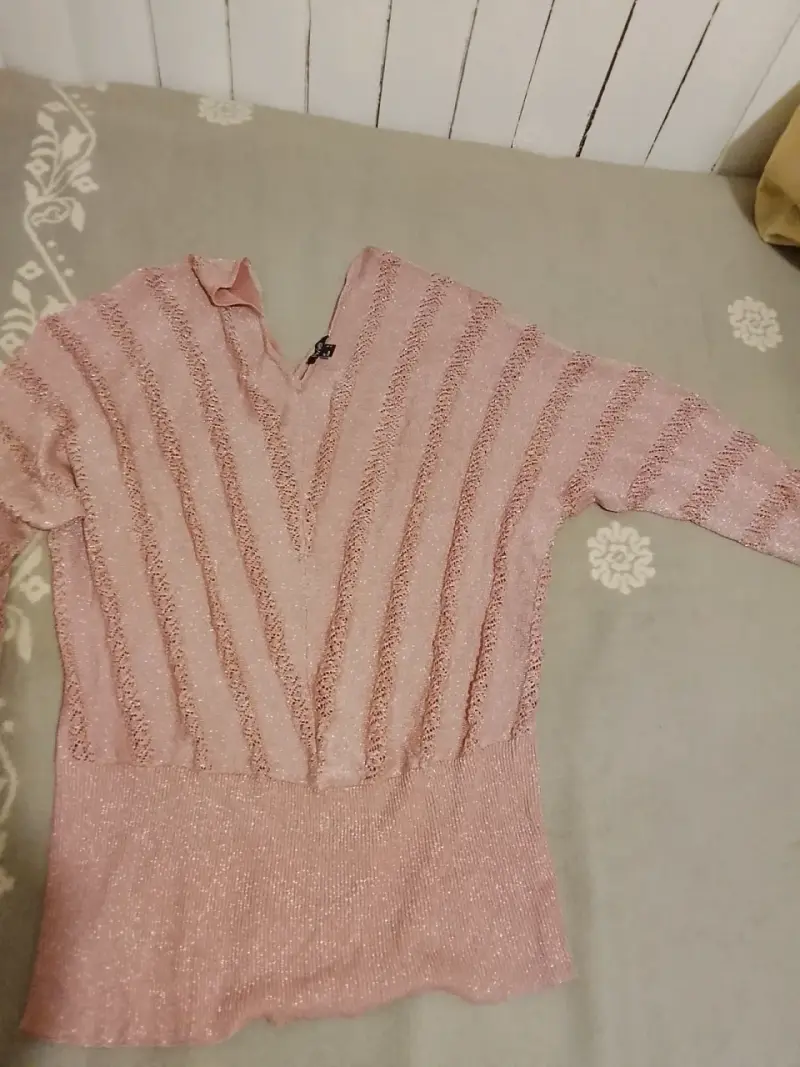 Suéter rosado con brillo para mujer