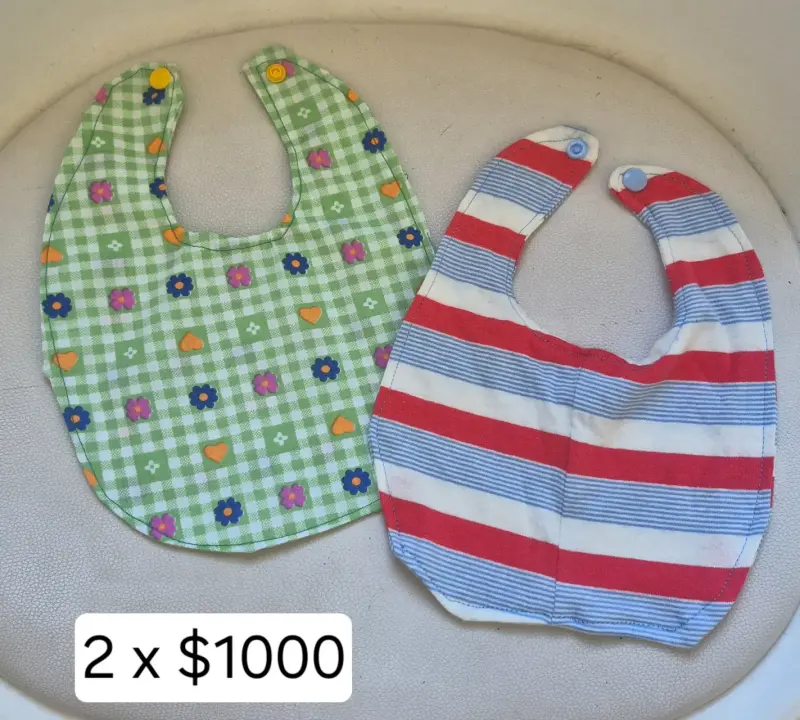 Set de 2 baberos estampados para bebé