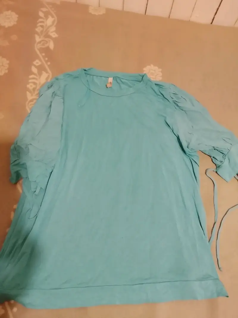 Blusa celeste de manga larga