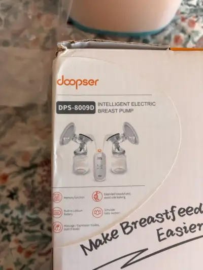 Extractor de leche eléctrico Doopser con accesorios - miniatura 3