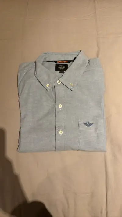 Camisa azul Supreme Flex para hombre. Marca Docker - miniatura 1