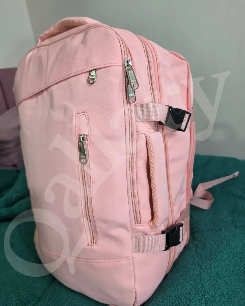 Mochila rosa grande con múltiples compartimentos - 1