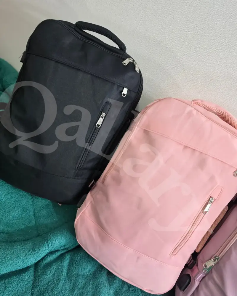 Mochila rosa grande con múltiples compartimentos - 3