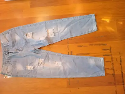 Jeans desgastados de mezclilla azul claro - miniatura 2