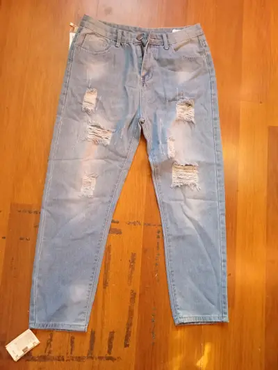 Jeans desgastados de mezclilla azul claro - miniatura 3