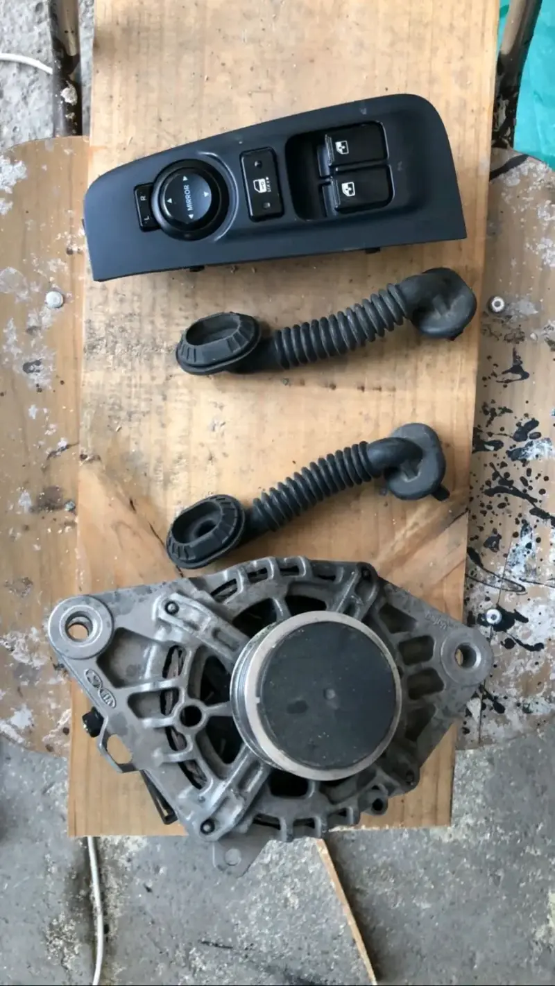 Alternador y controles de ventana para auto