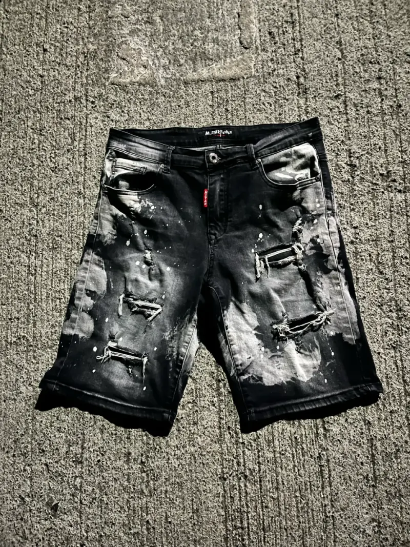 Bermudas de mezclilla negras desgastadas - 1