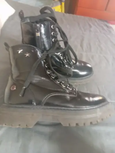 Botas negras de cuero con plataforma - miniatura 1