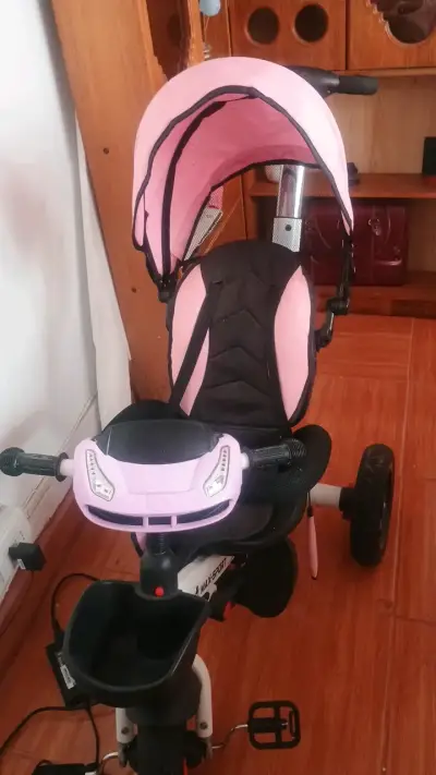 Triciclo infantil con toldo rosa - miniatura 1