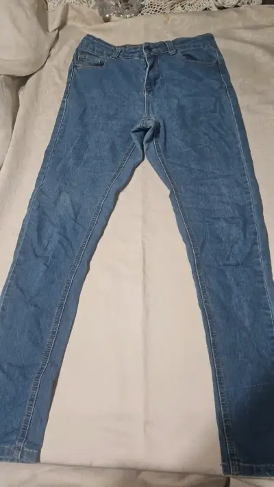 Jeans de mezclilla azul para mujer - miniatura 1