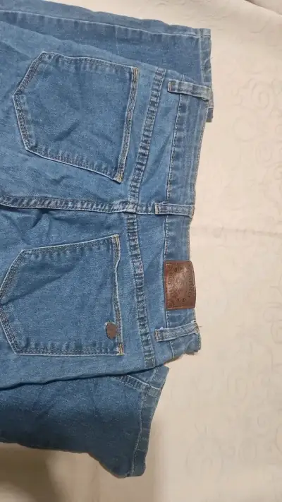 Jeans de mezclilla azul para mujer - miniatura 3