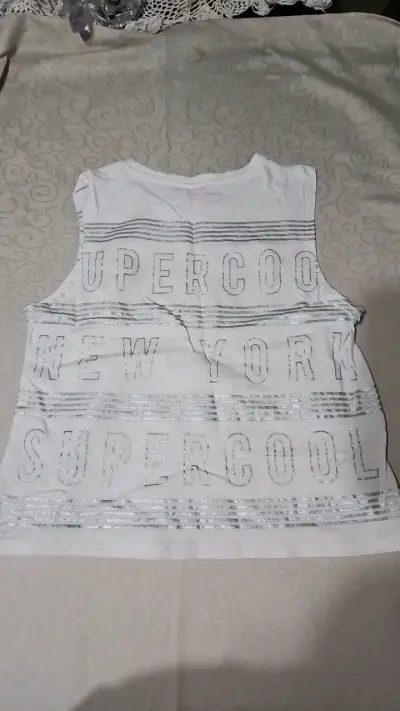 Polera sin mangas blanca con diseño 'Supercool' - miniatura 2