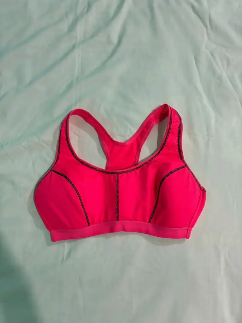 Top deportivo rosado para mujer