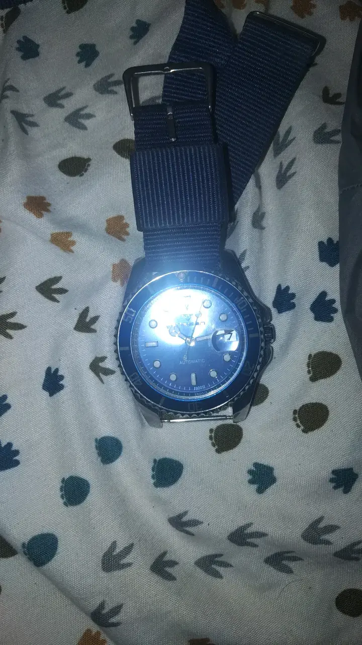 Reloj automático azul con correa de tela - 1