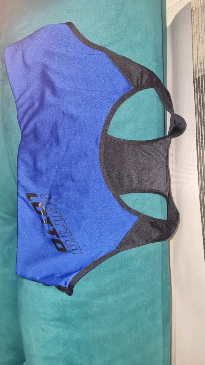 Polera deportiva Lotto azul y negra - 1