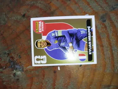 Extra Sticker Kylian Mbappé Oro Coleccionable - miniatura 1
