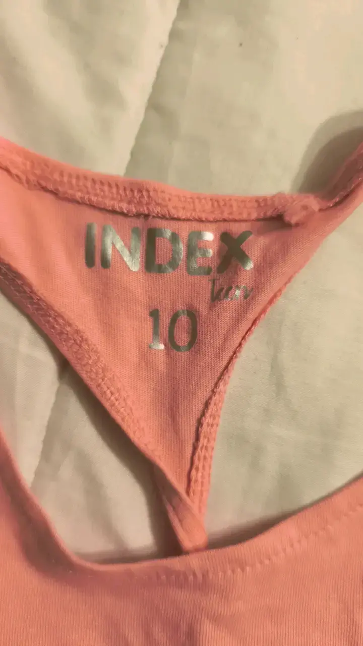 Polera sin mangas rosa con estampado NIÑA floral - 2