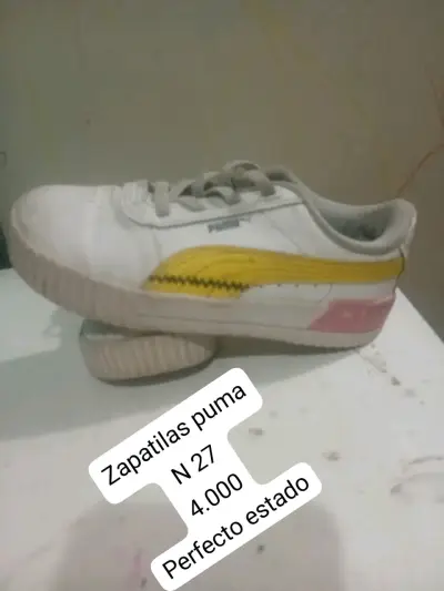 Zapatillas Puma blancas con detalles amarillos - miniatura 1