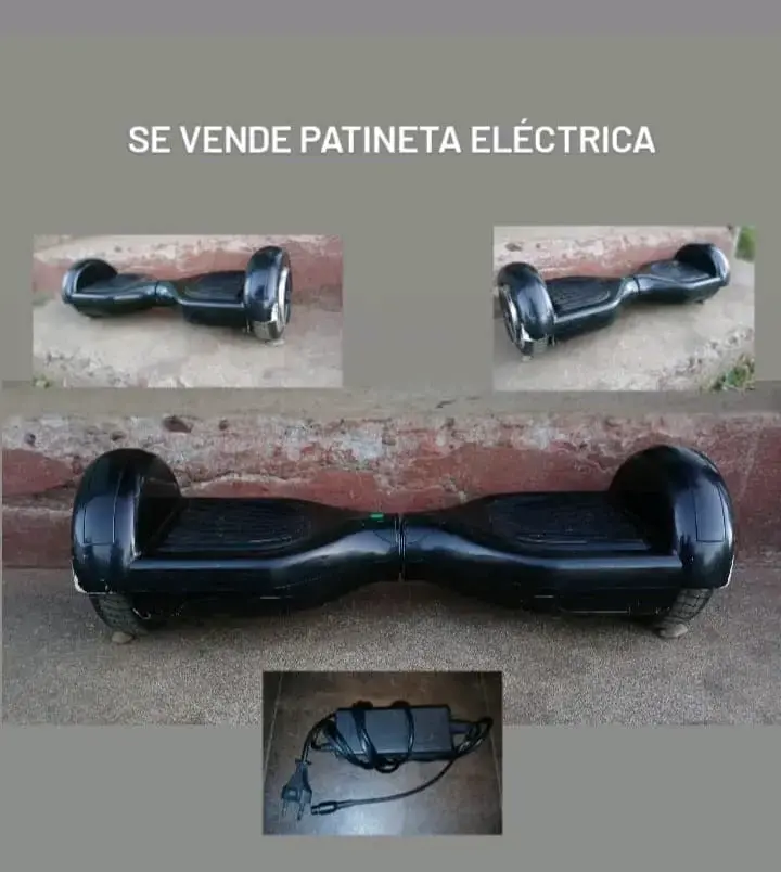 Patineta eléctrica negra con cargador