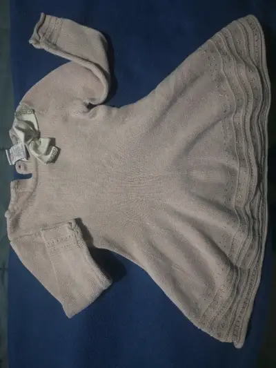 Vestido de bebé rosado con lazo decorativo - miniatura 1