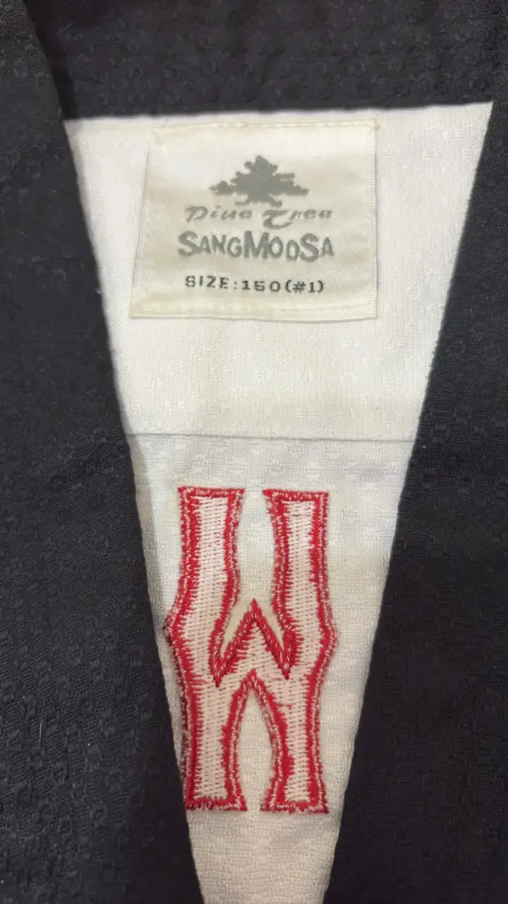 Dobok de taekwondo Daedo blanco y negro - 2