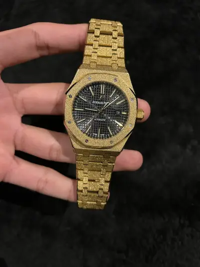 Reloj automático dorado Audemars Piguet - miniatura 1