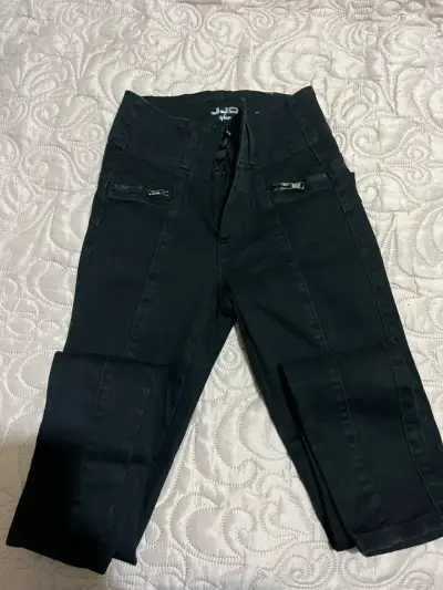 Pantalones negros de mujer con cierre - miniatura 2