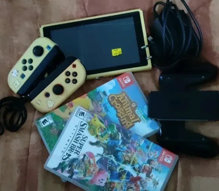 Nintendo Switch con accesorios, juegos y microsd - 1