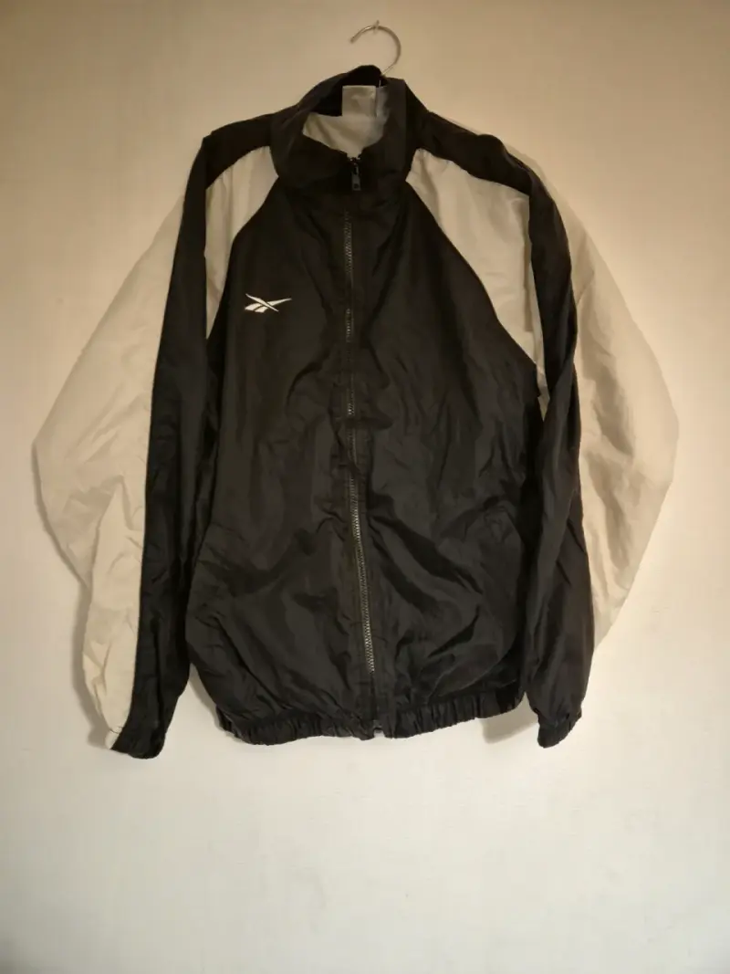 Cortavientos Reebok negro y blanco unisex - 1