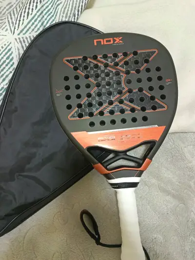 Pala de pádel Nox Genius 12K con funda - miniatura 1