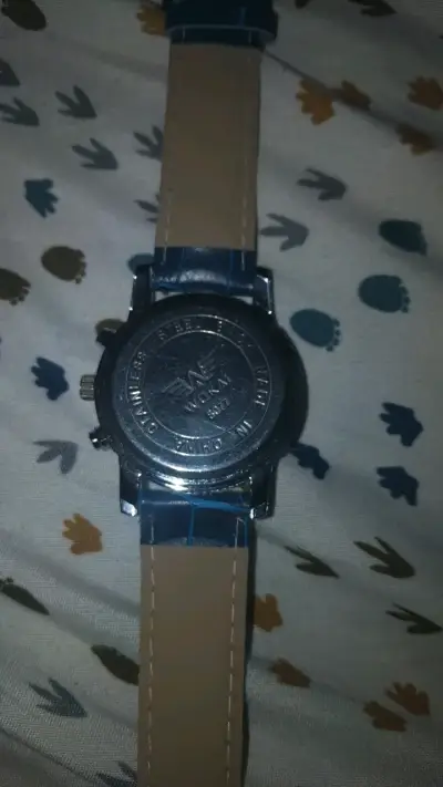 Reloj análogo azul con correa de cuero - miniatura 2
