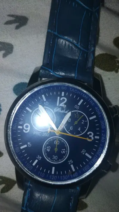 Reloj análogo azul con correa de cuero - miniatura 4