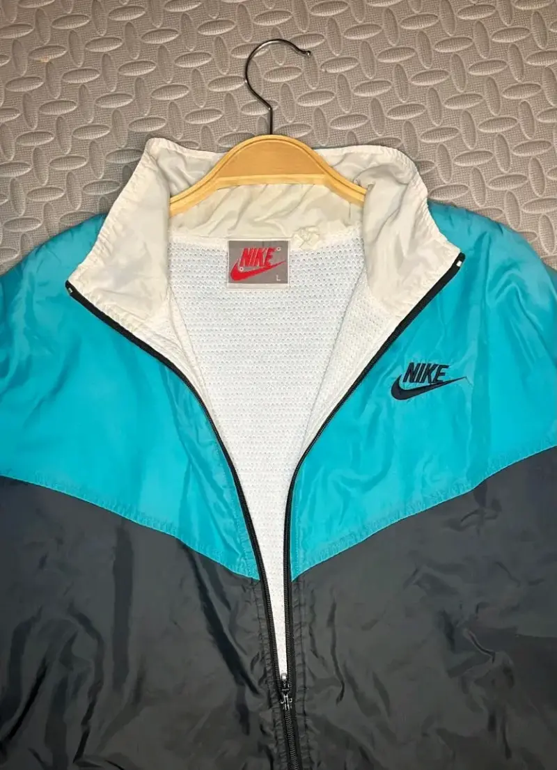 Chaqueta cortaviento Nike azul y negra talla L - 4
